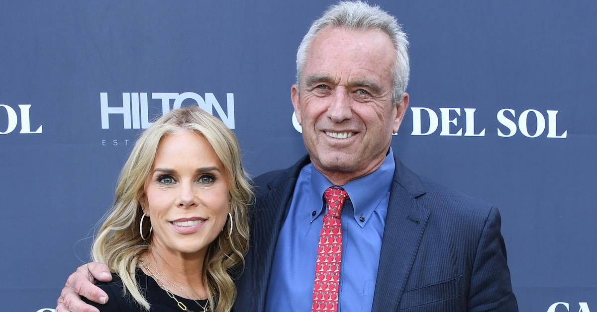 Robert F. Kennedy Jr. and Cheryl Hines at an event, smiling