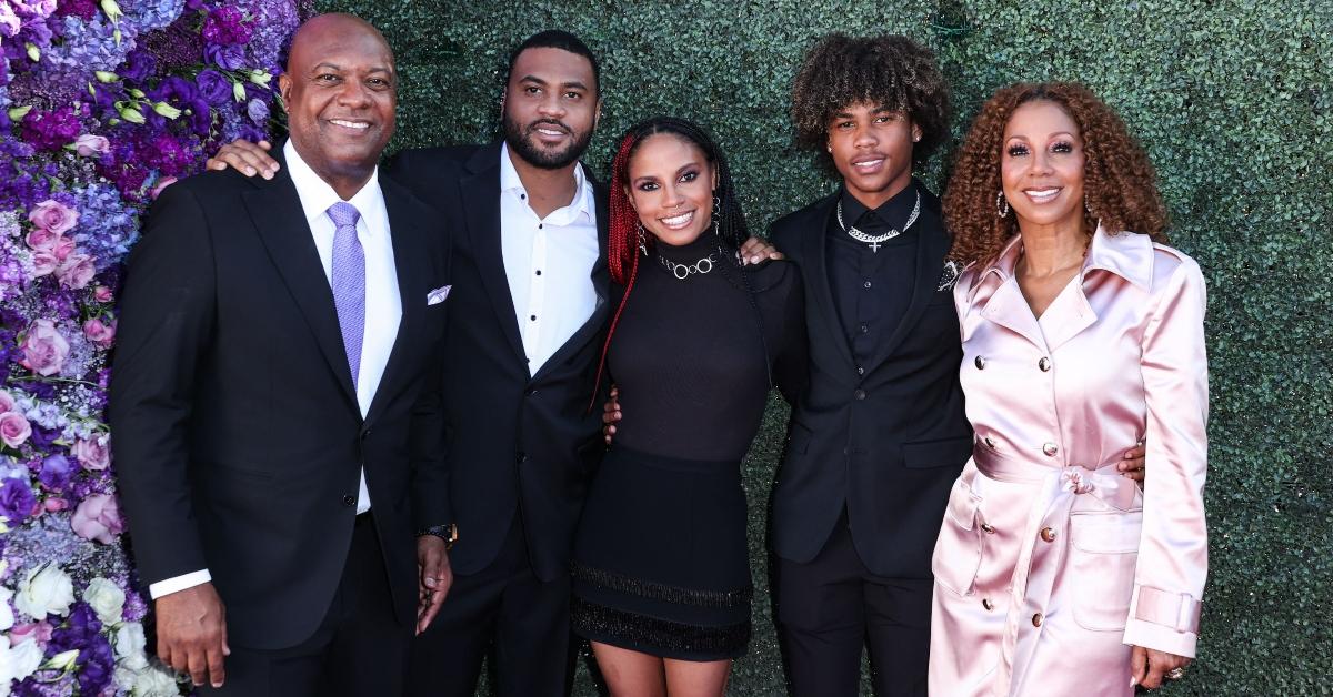 Rodney Peete, Holly Robinson Peete, and three of their kids