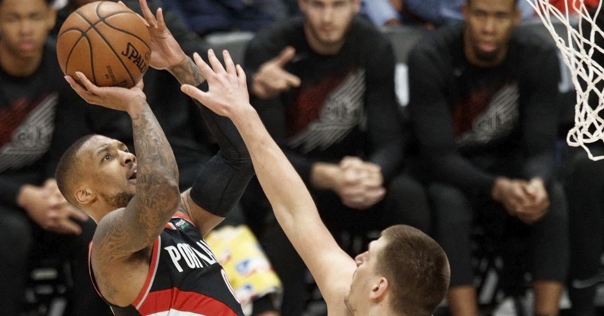 Damian Lillard shooting a jump shot in the 2019 NBA playoffs.