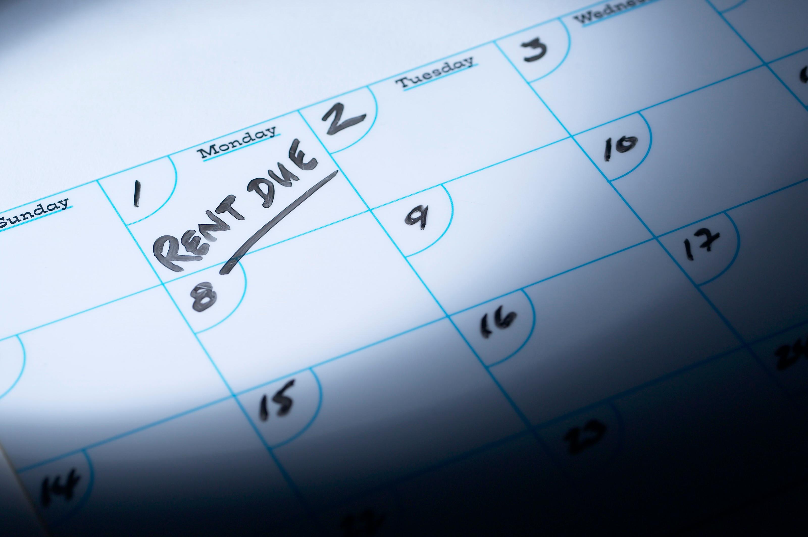 A calendar with rent due date marked on it.