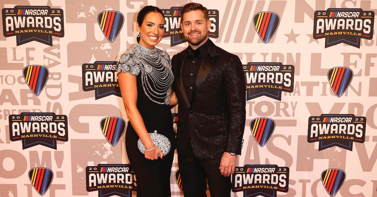 Ricky Stenhouse Jr. and wife, Madyson Stenhouse pose for photos on the red carpet prior to the NASCAR Awards and Champion Celebration at the Music City Center on November 30, 2023 in Nashville
