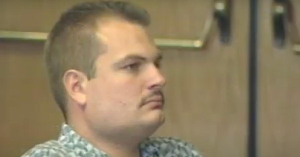 Troy Zink sits in a courtroom 
