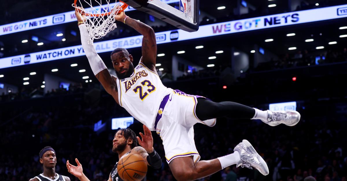 LeBron James dunking on the Nets in 2024