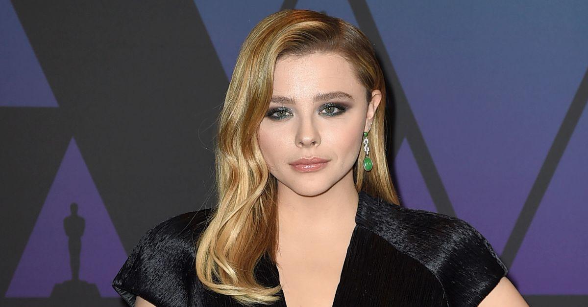 Chloë Grace Moretz posing at an event.