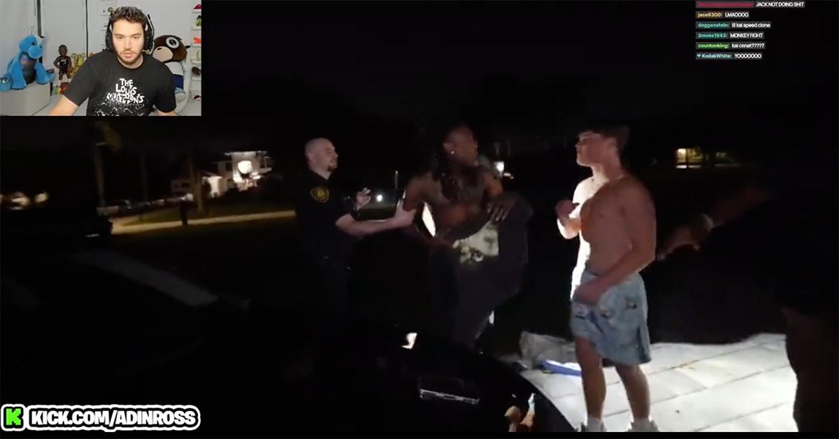 Jack Doherty and Izi Prime outside of Jack Doherty's house with police. 