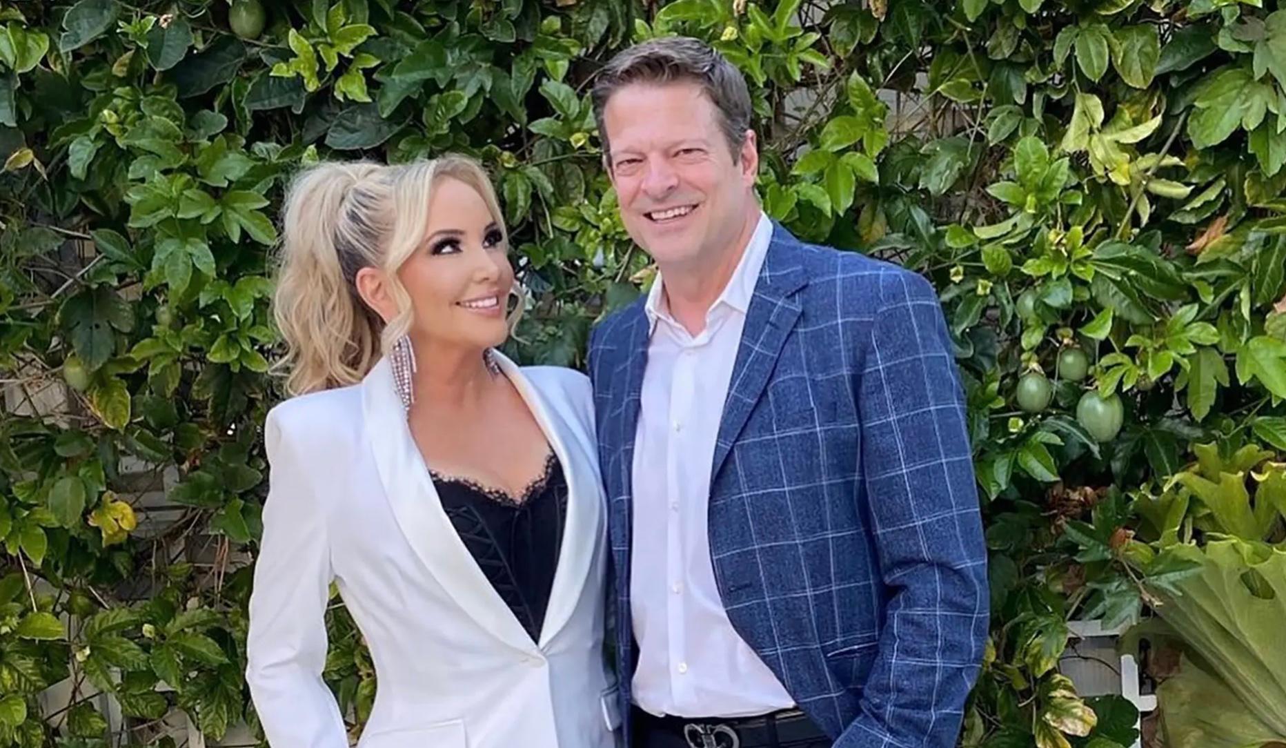 Shannon Beador and John Janssen smiling outside